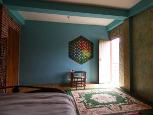 Voodi või voodid majutusasutuse Sara's Backpackers Hotel toas