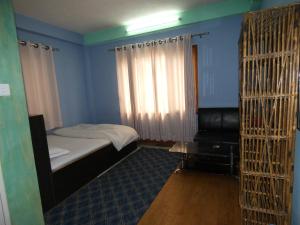 Voodi või voodid majutusasutuse Sara's Backpackers Hotel toas