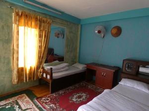 Voodi või voodid majutusasutuse Sara's Backpackers Hotel toas