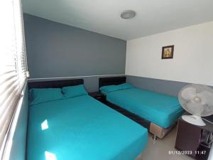 Postel nebo postele na pokoji v ubytování CENTRO! San Lorenzo - Downtown - Apartaestudio Familiar