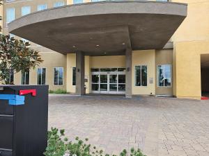 a large building with a large entrance to a building at Five minutes walk unit Disneyland Anaheim Staybridge Suites in Anaheim