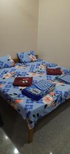 DANDELI CROCODILE EDGE HOME STAY客房内的一张或多张床位