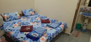 DANDELI CROCODILE EDGE HOME STAY客房内的一张或多张床位