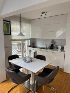 Kuchyň nebo kuchyňský kout v ubytování Bled lux apartment + 6 fotografií