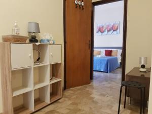 a living room with a door to a room at B&B Monté in Montesilvano
