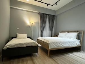 Krevet ili kreveti u jedinici u okviru objekta ChengDian Homestay