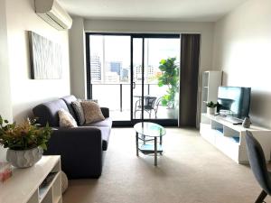 A seating area at Hobart Inner City Apartment