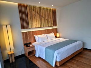 Letto o letti in una camera di The Trees, Kandy