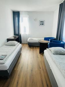 Ένα ή περισσότερα κρεβάτια σε δωμάτιο στο Pokoje Gościnne Strumykowa