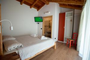 Posteľ alebo postele v izbe v ubytovaní La Lesivèra Bed and Breakfast