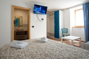 Posteľ alebo postele v izbe v ubytovaní La Lesivèra Bed and Breakfast