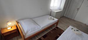 Posteľ alebo postele v izbe v ubytovaní Dom Stefany
