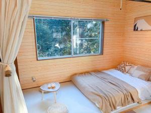 Voodi või voodid majutusasutuse Sound Villa toas