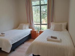 Postel nebo postele na pokoji v ubytování Springfield Retreat 4 bedrooms