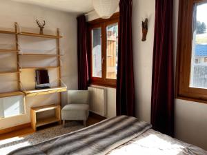 Postel nebo postele na pokoji v ubytování Mountain View Apartment in Morzine + 17 fotografií