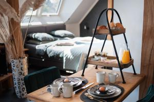 Postel nebo postele na pokoji v ubytování Loft 32