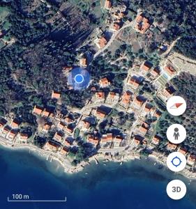an aerial view of a city with two white circles at RITA - Charming 2-Bedroom Apartment with sea view, Slano in Slano