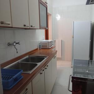 Kuchyň nebo kuchyňský kout v ubytování Casa Vacanze da Anna