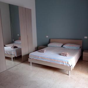 Postel nebo postele na pokoji v ubytování Casa Vacanze da Anna