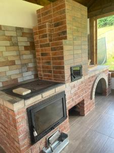 TV a/nebo společenská místnost v ubytování Casa Roșca