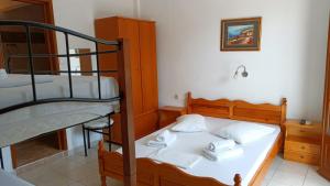 A bed or beds in a room at Anastasia