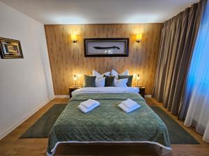 En eller flere senge i et værelse på Aristocratic Home + 73 billeder