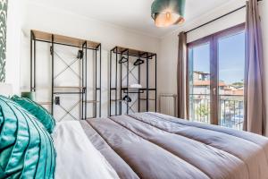 Postel nebo postele na pokoji v ubytování Nepi green apartment