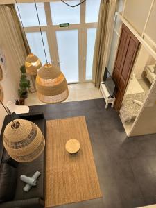 an overhead view of a living room with a table at Alex- DUPLEX APARTMENT- City in Valencia