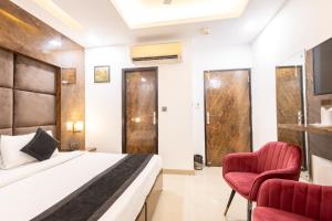 Sjónvarps- og/eða afþreyingartæki á Hotel Cosmo Near BLK Hospital Karol Bagh