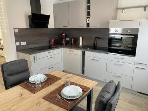 Η κουζίνα ή μικρή κουζίνα στο Ferienwohnung „zur Sonne“