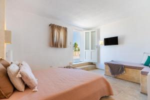מיטה או מיטות בחדר ב-Masseria La Macina