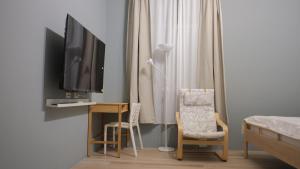 TV i/ili multimedijalni sistem u objektu ChengDian Homestay