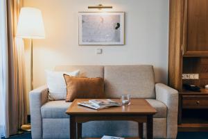 Posezení v ubytování Hotel Reindl Suiten & Appartments