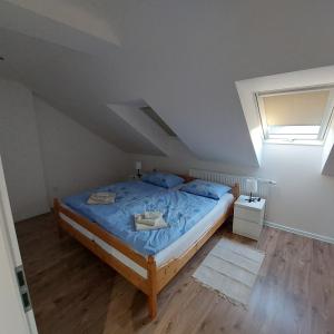 Postel nebo postele na pokoji v ubytování Apartmán Milan