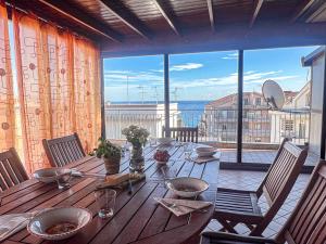 Posezení v ubytování Beach House Roccalumera