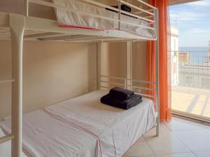 Postel nebo postele na pokoji v ubytování Beach House Roccalumera