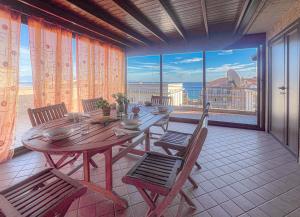 Balkón nebo terasa v ubytování Beach House Roccalumera + 14 fotografií