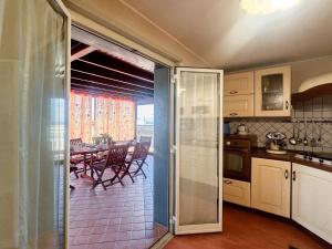Kuchyň nebo kuchyňský kout v ubytování Beach House Roccalumera