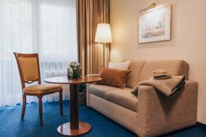 Posezení v ubytování Hotel Reindl Suiten & Appartments