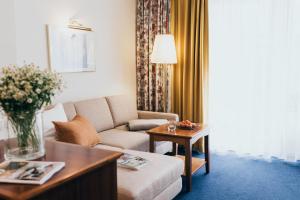 Posezení v ubytování Hotel Reindl Suiten & Appartments