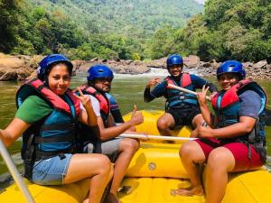 a group of people on a raft on a river at Ceylon Adventure Sports in Kitulgala +50 photos