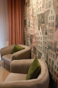 Ein Sitzbereich in der Unterkunft Apartament Milano