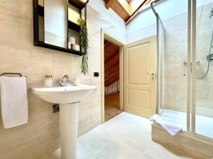 a bathroom with a sink and a shower at Blue Nest in Timişoara +36 photos