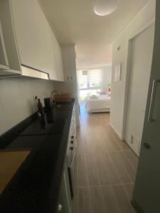 Køkken eller tekøkken på Departamento Studio Isla Teja