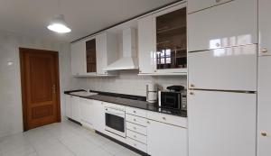Køkken eller tekøkken på Duplex Aldara