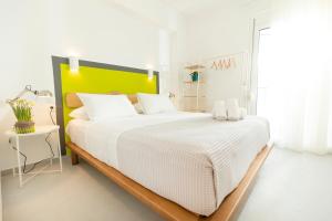 Llit o llits en una habitació de KIMIA Guest House