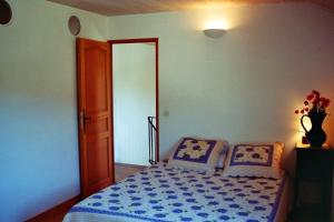 Ein Bett oder Betten in einem Zimmer der Unterkunft L'Ecluse