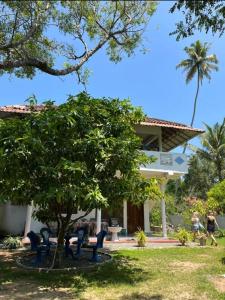 Κήπος έξω από το Malika Homestay
