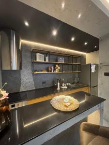 Кухня или мини-кухня в smgold lux apartman
