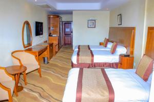 TV a/nebo společenská místnost v ubytování Mbale Resort Hotel